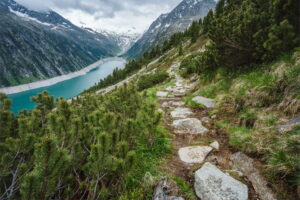 Beautiful view of Schlegeis Stausee on mountain hiking path trail. Zillertal, Austria, Europe