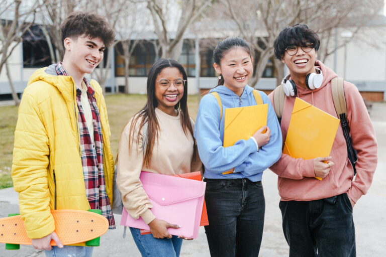 Multicultural College Student friends in the University Campus. International Exchange students